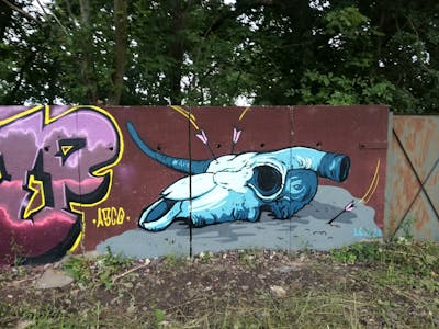 Light Blue and Colorful Special by Lagqaffe and LGQ. This Graffiti is located in Döbeln, Germany and was created in 2021. This Graffiti can be described as Special and Characters.