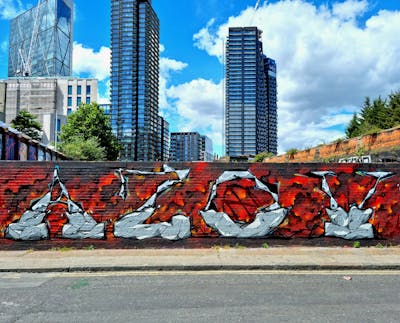 Grey and Red Stylewriting by SIDOK. This Graffiti is located in London, United Kingdom and was created in 2022.