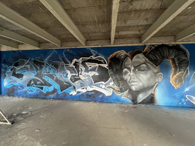 Light Blue and Grey Stylewriting by Chr15, TMF and shmri. This Graffiti is located in Leipzig, Germany and was created in 2024. This Graffiti can be described as Stylewriting, Abandoned and Characters.