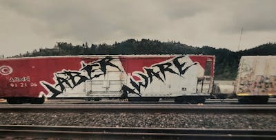 Black and White Stylewriting by Jaber and Aware. This Graffiti is located in United States and was created in 2009. This Graffiti can be described as Stylewriting, Trains and Freights.