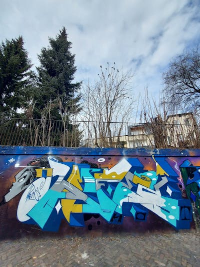 Cyan and Blue and Colorful Stylewriting by Fems173. This Graffiti is located in lublin, Poland and was created in 2023. This Graffiti can be described as Stylewriting, Characters and Wall of Fame.