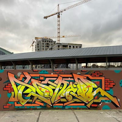 Yellow and Orange Stylewriting by Toner2 and OTZ. This Graffiti is located in Belgium and was created in 2020.