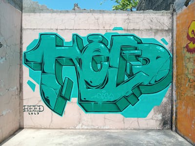 Cyan and Black Stylewriting by KEED and SDFK. This Graffiti is located in CAVITE, Philippines and was created in 2023. This Graffiti can be described as Stylewriting and Abandoned.