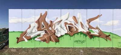 Brown and Light Green Stylewriting by casom and 7hells. This Graffiti is located in Köthen, Germany and was created in 2022. This Graffiti can be described as Stylewriting, 3D and Wall of Fame.
