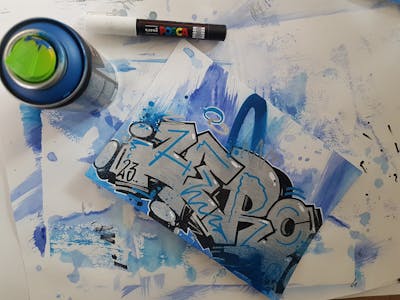 Chrome and Blue and Light Blue Blackbook by Hero. This Graffiti is located in Germany and was created in 2023.