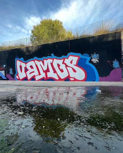Red and White and Light Blue Stylewriting by Vamos. This Graffiti is located in Valencia, Spain and was created in 2023. This Graffiti can be described as Stylewriting and Wall of Fame.