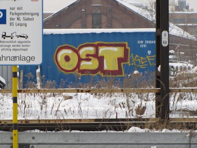 Yellow and Red Stylewriting by urine and OST. This Graffiti is located in Leipzig, Germany and was created in 2010. This Graffiti can be described as Stylewriting, Line Bombing and Street Bombing.