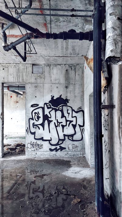 Black Stylewriting by Cimet. This Graffiti is located in Zagreb, Croatia and was created in 2023. This Graffiti can be described as Stylewriting, Abandoned and Throw Up.
