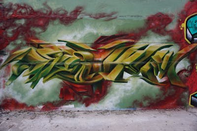 Red and Green Stylewriting by Spektrum. This Graffiti is located in Rostock, Germany and was created in 2021. This Graffiti can be described as Stylewriting and 3D.