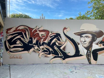 Beige and Brown Stylewriting by EKLE. This Graffiti is located in Oslo, Norway and was created in 2022. This Graffiti can be described as Stylewriting, Characters and Wall of Fame.