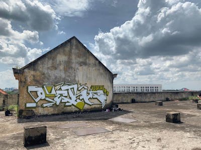 White Stylewriting by OVERT. This Graffiti is located in Saigon, Viet Nam and was created in 2019. This Graffiti can be described as Stylewriting and Abandoned.