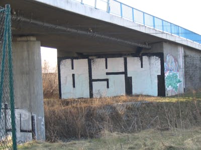 White and Black Stylewriting by urine, kafor and OST. This Graffiti is located in Zschortau, Germany and was created in 2006. This Graffiti can be described as Stylewriting, Street Bombing and Roll Up.