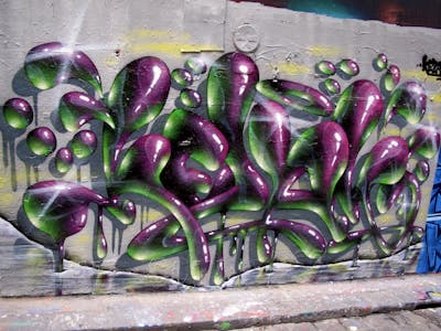 Violet and Light Green Stylewriting by Kezam. This Graffiti is located in Melbourne, Australia and was created in 2022. This Graffiti can be described as Stylewriting, 3D and Wall of Fame.