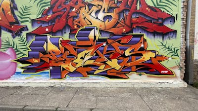 Orange and Colorful Stylewriting by Picks and Spast. This Graffiti is located in Hettstedt Hafenbar, Germany and was created in 2022.