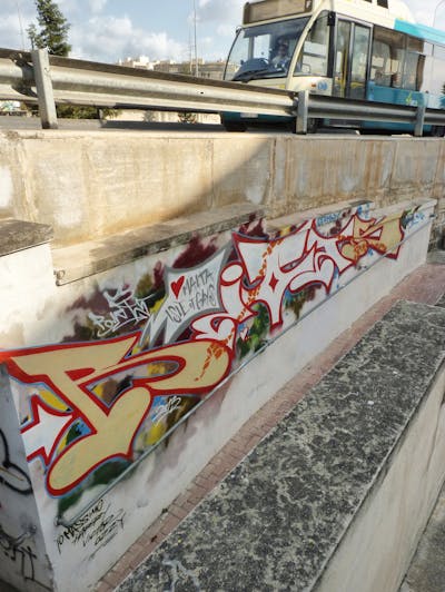 Red and Beige Stylewriting by Riots. This Graffiti is located in Malta and was created in 2013. This Graffiti can be described as Stylewriting and Street Bombing.