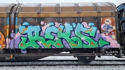 Light Green and Colorful Stylewriting by REKS. This Graffiti is located in Sweden and was created in 2024. This Graffiti can be described as Stylewriting, Trains and Freights.