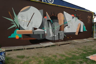 Grey and Brown Characters by Ralod. This Graffiti is located in Bratislava, Slovakia and was created in 2022. This Graffiti can be described as Characters and Futuristic.