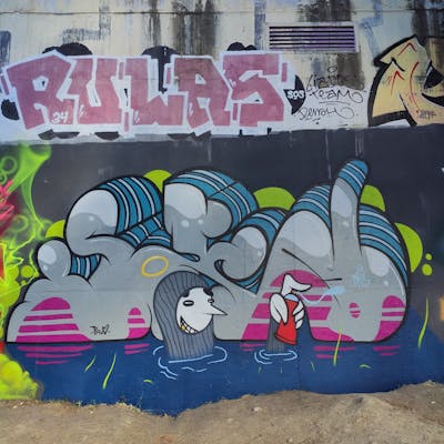 Grey and Colorful Stylewriting by NKS. This Graffiti is located in madrid, Spain and was created in 2023. This Graffiti can be described as Stylewriting and Characters.