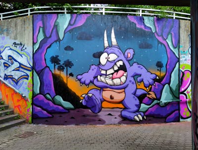 Violet and Colorful Characters by HAMPI and BISTE. This Graffiti is located in WARENDORF, Germany and was created in 2022. This Graffiti can be described as Characters and Streetart.