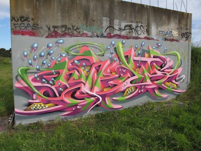 Coralle and Light Green Stylewriting by Kezam. This Graffiti is located in Auckland, New Zealand and was created in 2019. This Graffiti can be described as Stylewriting and 3D.