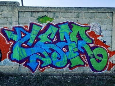 Blue and Light Green and Red Street Bombing by CEAR.ONE. This Graffiti is located in Bari, Italy and was created in 2023. This Graffiti can be described as Street Bombing and Stylewriting.