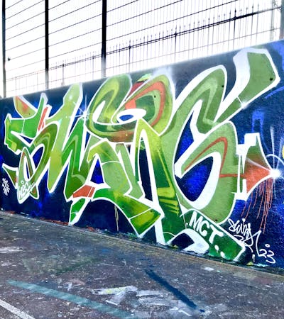 Light Green and Blue Stylewriting by MCT, WBC and Swing. This Graffiti is located in Lyon, France and was created in 2023. This Graffiti can be described as Stylewriting and Wall of Fame.