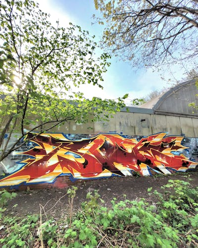Red and Yellow Stylewriting by Riots. This Graffiti is located in Leipzig, Germany and was created in 2024.