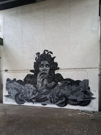 Grey and Black Stylewriting by rizok, R120K and bros. This Graffiti is located in Leipzig, Germany and was created in 2021. This Graffiti can be described as Stylewriting, Characters and Abandoned.