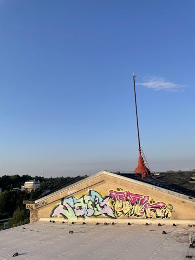 Colorful Stylewriting by Safi and ATK. This Graffiti is located in Germany and was created in 2023. This Graffiti can be described as Stylewriting and Atmosphere.