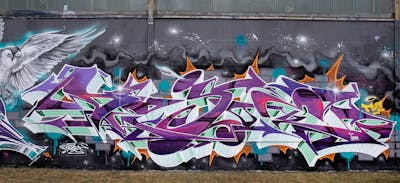Cyan and Violet Stylewriting by dejoe. This Graffiti is located in Dresden, Germany and was created in 2022. This Graffiti can be described as Stylewriting, Wall of Fame, Murals and Characters.