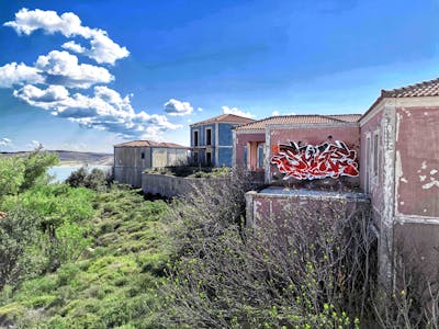 Red and White Stylewriting by Shuen_STBcew and Classiks. This Graffiti is located in Lemnos, Greece and was created in 2022. This Graffiti can be described as Stylewriting and Abandoned.