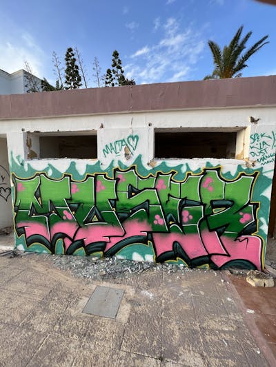 Coralle and Green Stylewriting by Muser. This Graffiti is located in Mellieha, Malta and was created in 2023. This Graffiti can be described as Stylewriting and Abandoned.