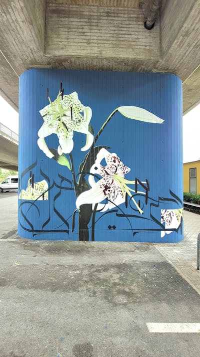 Light Blue and White Characters by urine and OST. This Graffiti is located in Konstanz, Germany and was created in 2023. This Graffiti can be described as Characters, Handstyles and Streetart.