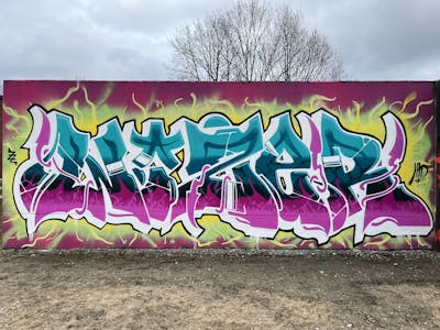 Colorful Stylewriting by Wizer. This Graffiti is located in Denmark and was created in 2023. This Graffiti can be described as Stylewriting and Wall of Fame.