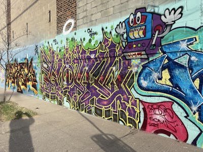 Violet and Colorful Stylewriting by Goal and gomd. This Graffiti is located in Staten Island NY, United States and was created in 2024. This Graffiti can be described as Stylewriting and Wall of Fame.