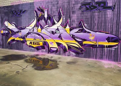 Violet and Yellow Stylewriting by Syck, ABS, KKP and Los Capitanos. This Graffiti is located in Germany and was created in 2017. This Graffiti can be described as Stylewriting and Wall of Fame.