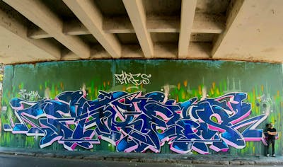 Blue and Colorful Stylewriting by Fares. This Graffiti is located in Milano, Italy and was created in 2021. This Graffiti can be described as Stylewriting and Wall of Fame.
