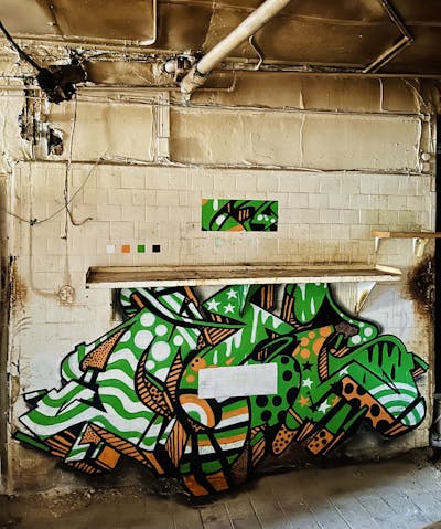 Green and Orange Stylewriting by MOI. This Graffiti is located in New York, United States and was created in 2022.