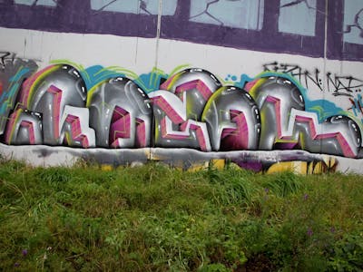 Grey and Coralle Stylewriting by Kezam. This Graffiti is located in Auckland, New Zealand and was created in 2022.