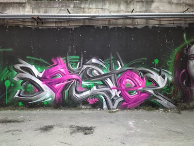 Grey and Colorful Stylewriting by Sainter. This Graffiti is located in Banska Bystrica, Slovakia and was created in 2021. This Graffiti can be described as Stylewriting, Wall of Fame and Futuristic.