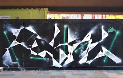 White and Black Stylewriting by SIDOK and Royal Cru. This Graffiti is located in London, United Kingdom and was created in 2019. This Graffiti can be described as Stylewriting and Wall of Fame.