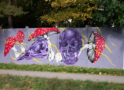 Violet and Grey and Red Characters by Dosy Doss. This Graffiti is located in Prostějov, Czech Republic and was created in 2023. This Graffiti can be described as Characters and Streetart.