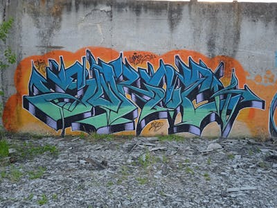 Cyan and Orange Stylewriting by Sorce and DTMS. This Graffiti is located in Belgrade, Serbia and was created in 2023.