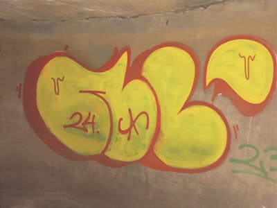 Yellow and Red Throw Up by NULL. This Graffiti is located in Sândominic, Romania and was created in 2024.