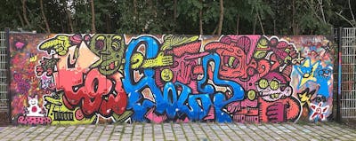 Colorful Stylewriting by Hülpman, Egosoup, OST, PÜTK, TDZ, RWRZ and CCS. This Graffiti is located in Berlin, Germany and was created in 2020. This Graffiti can be described as Stylewriting, Characters and Streetart.