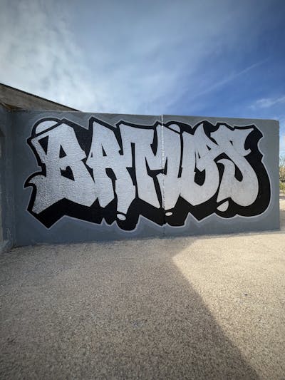 Chrome and Black Stylewriting by Bamos. This Graffiti is located in Valencia, Spain and was created in 2023.