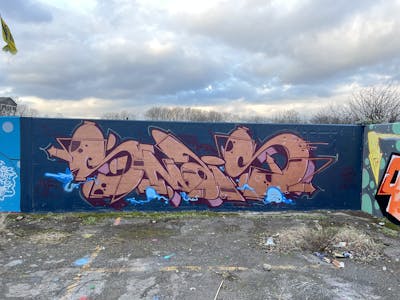 Brown and Blue Stylewriting by smais, TRD and Herz. This Graffiti is located in Dortmund, Germany and was created in 2023. This Graffiti can be described as Stylewriting and Wall of Fame.