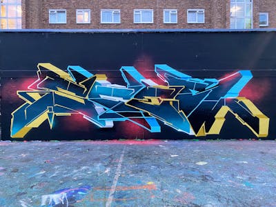 Yellow and Light Blue and Colorful Stylewriting by Sfer. This Graffiti is located in London, United Kingdom and was created in 2024. This Graffiti can be described as Stylewriting and Wall of Fame.