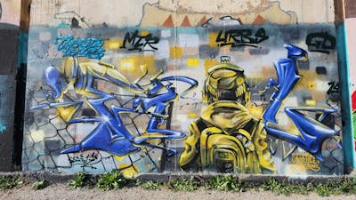 Yellow and Grey and Colorful Stylewriting by fil. This Graffiti is located in Lleida, Spain and was created in 2024. This Graffiti can be described as Stylewriting and Characters.