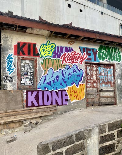Colorful Stylewriting by Kidney. This Graffiti is located in Bali, Indonesia and was created in 2023. This Graffiti can be described as Stylewriting and Abandoned.